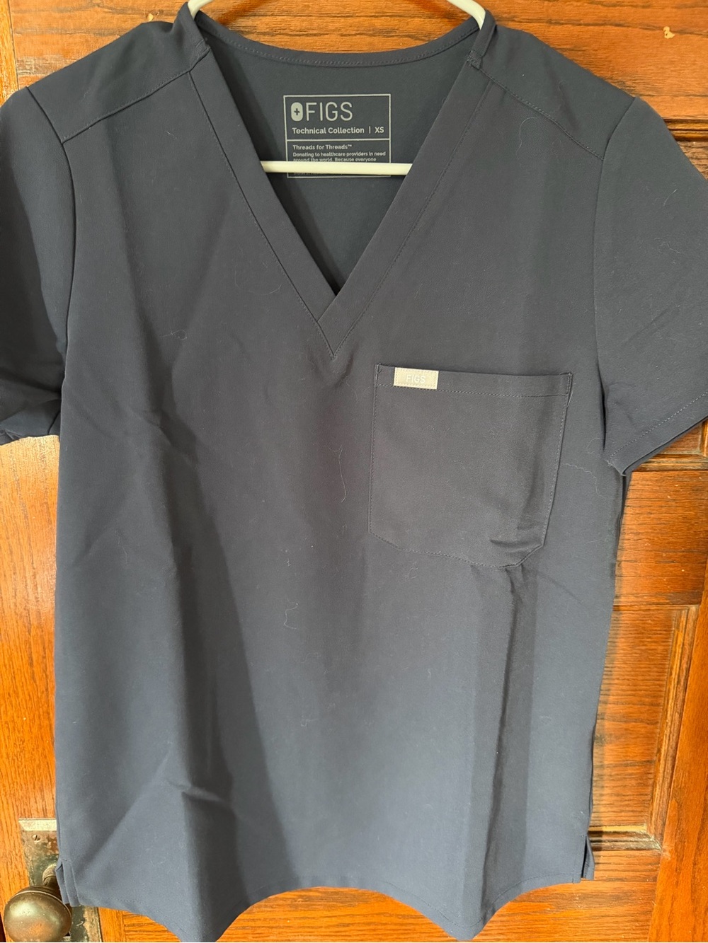 FIGS Women’s Short Sleeve V-Neck Scrub Top in Navy